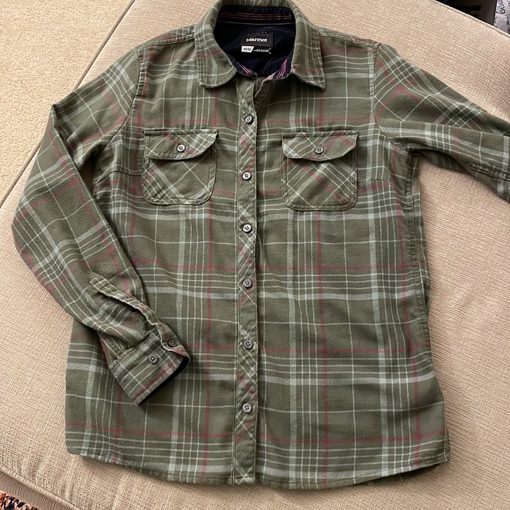 Marmot flannel in light green plaid. Size medium.